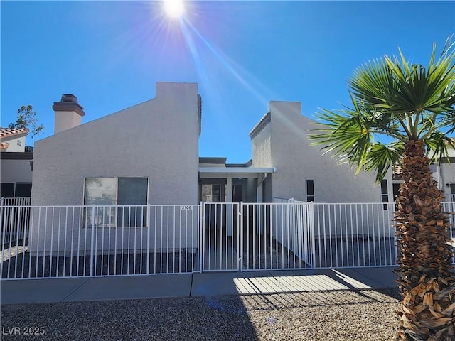2106 Pebble Creek Ln, Laughlin, NV 89029 - back of property with stucco siding