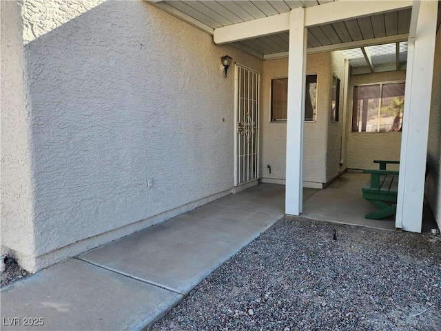 2106 Pebble Creek Ln, Laughlin, NV 89029 - view of exterior entry with stucco siding