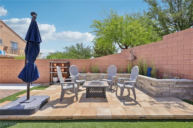 10329 Walworth Ave, Las Vegas, NV 89166 - fenced backyard featuring a fire pit and a patio area