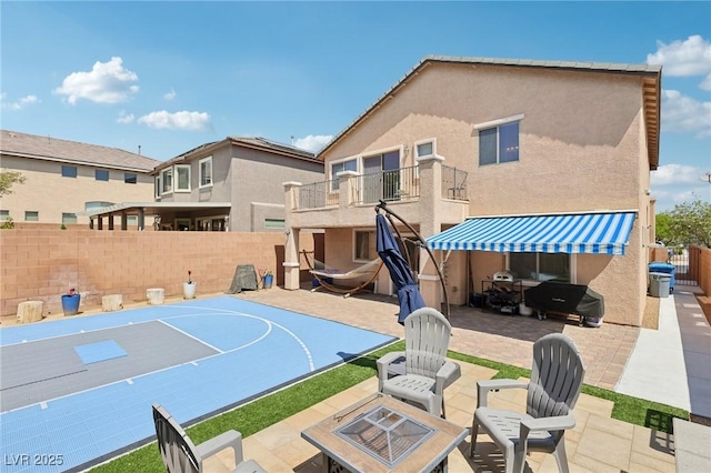 10329 Walworth Ave, Las Vegas, NV 89166 - view of basketball court featuring a fenced backyard and basketball court
