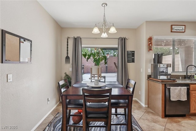 10329 Walworth Ave, Las Vegas, NV 89166 - dining space with a chandelier, light tile patterned floors, and baseboards