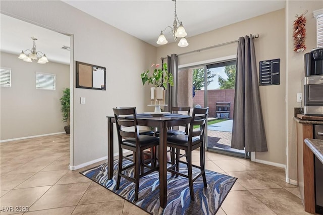 10329 Walworth Ave, Las Vegas, NV 89166 - dining space with a chandelier, plenty of natural light, and light tile patterned flooring