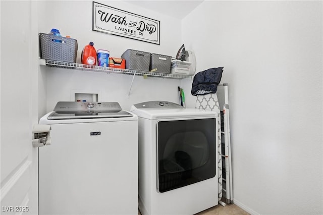 10329 Walworth Ave, Las Vegas, NV 89166 - laundry area featuring separate washer and dryer and baseboards