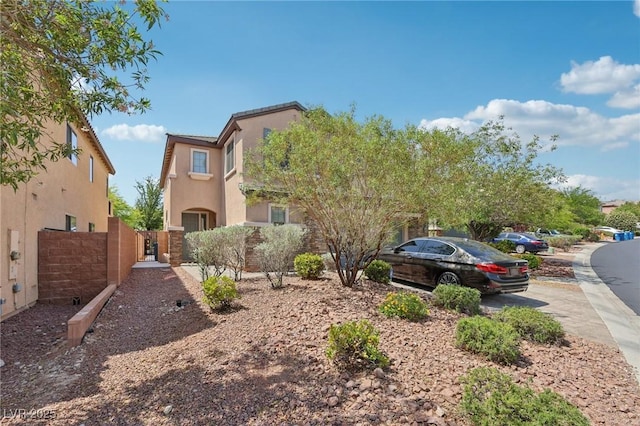 10329 Walworth Ave, Las Vegas, NV 89166 - view of front of home featuring stucco siding