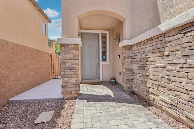 10329 Walworth Ave, Las Vegas, NV 89166 - entrance to property featuring stucco siding and stone siding