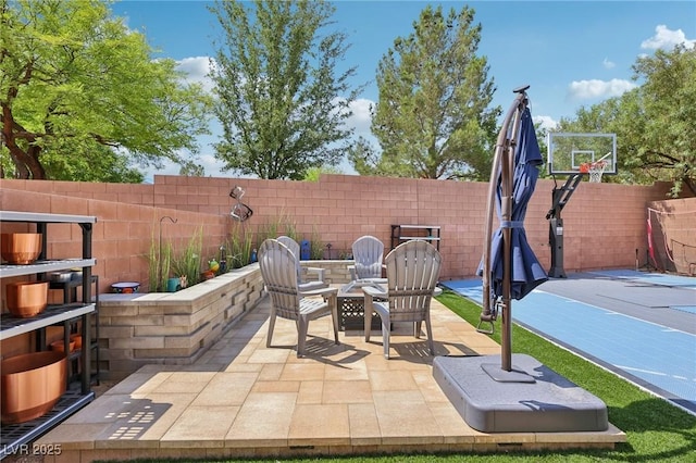 10329 Walworth Ave, Las Vegas, NV 89166 - view of patio / terrace with an outdoor fire pit