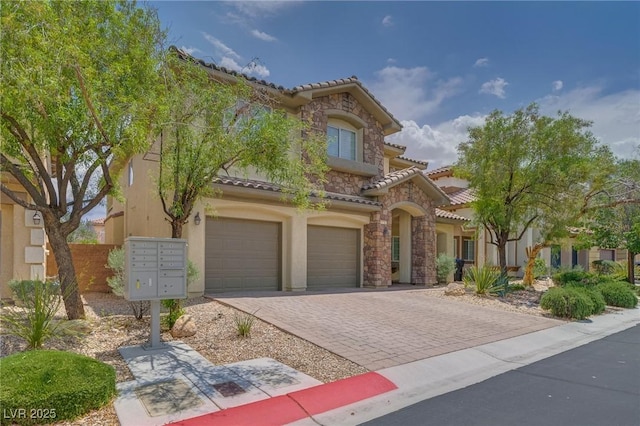 9792 Crescent Lodge Ct, Las Vegas, NV 89178 - mediterranean / spanish-style home featuring a tile roof, an attached garage, stucco siding, stone siding, and driveway