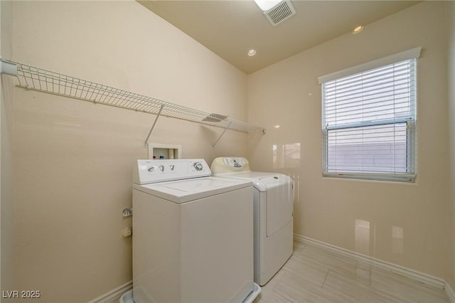 9792 Crescent Lodge Ct, Las Vegas, NV 89178 - washroom with washing machine and dryer and baseboards