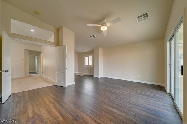 9792 Crescent Lodge Ct, Las Vegas, NV 89178 - unfurnished room featuring dark wood-style flooring, a ceiling fan, and baseboards