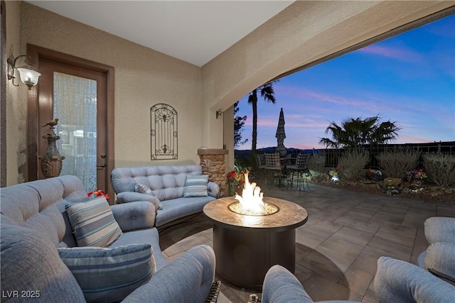 2749 Liberation Dr, Henderson, NV 89044 - view of patio / terrace with an outdoor living space with a fire pit