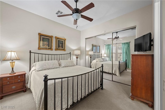2749 Liberation Dr, Henderson, NV 89044 - bedroom featuring light carpet, a closet, and ceiling fan