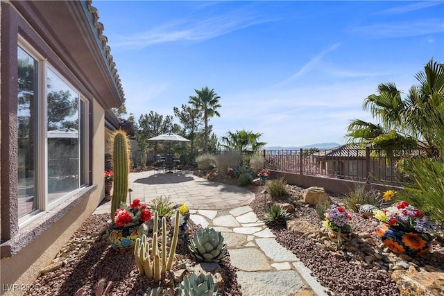 2749 Liberation Dr, Henderson, NV 89044 - fenced backyard featuring a patio