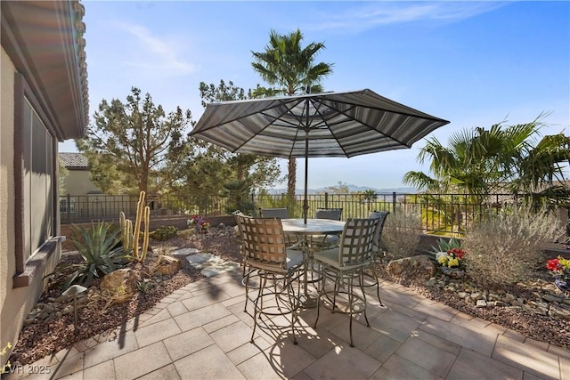 2749 Liberation Dr, Henderson, NV 89044 - fenced backyard featuring a patio area and outdoor dining space