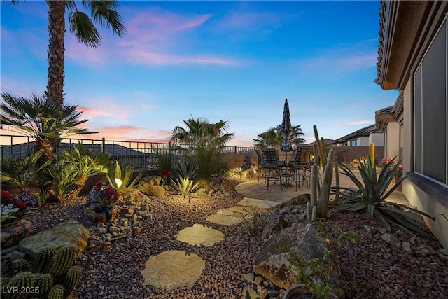 2749 Liberation Dr, Henderson, NV 89044 - fenced backyard featuring a patio area