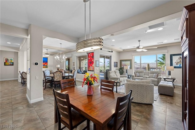2749 Liberation Dr, Henderson, NV 89044 - dining space featuring ceiling fan, baseboards, recessed lighting, tile patterned floors, and a chandelier