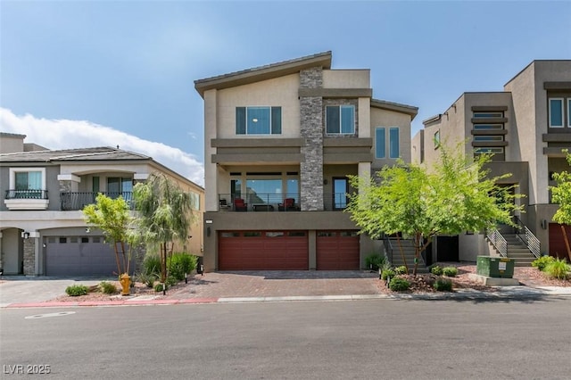 7077 Sunland Hills Ave, Las Vegas, NV 89113 - contemporary house with stucco siding, a garage, stairway, and driveway
