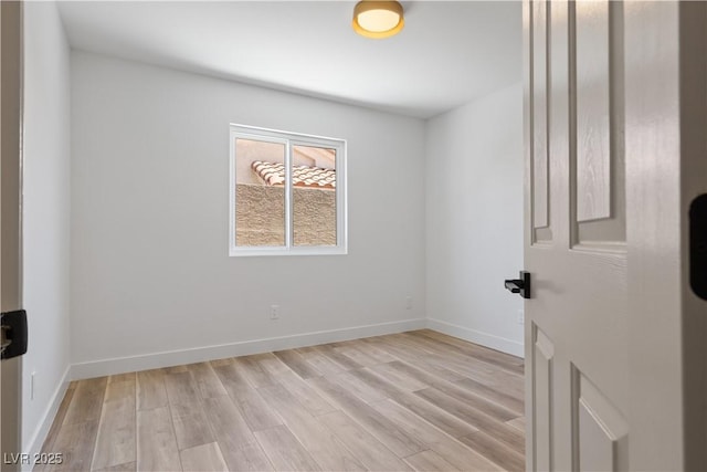 8032 Deep Stone Ave, Las Vegas, NV 89149 - empty room featuring light wood-style flooring and baseboards