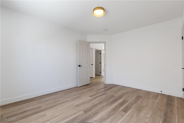 8032 Deep Stone Ave, Las Vegas, NV 89149 - unfurnished room featuring light wood-style flooring and baseboards