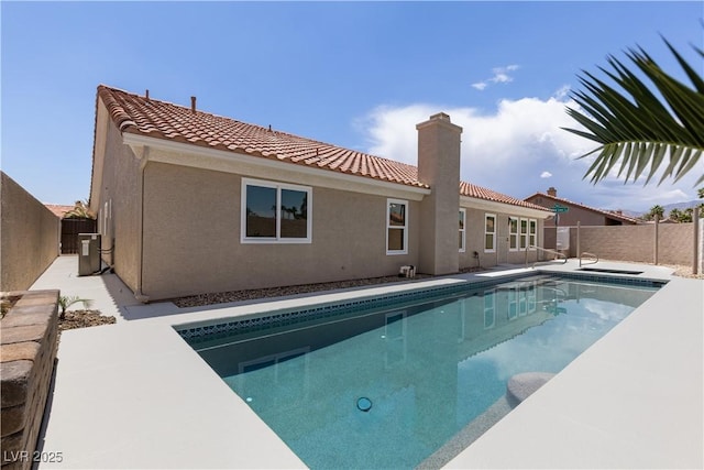 8032 Deep Stone Ave, Las Vegas, NV 89149 - view of pool with a fenced backyard, central air condition unit, and a patio area