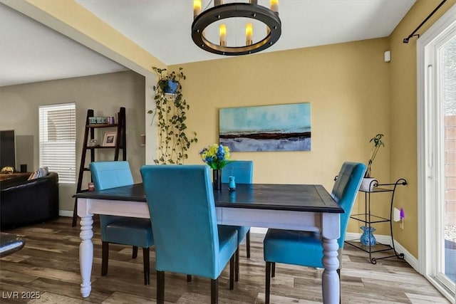 9236 Keystone Ridge Ave, Las Vegas, NV 89148 - dining space with wood finished floors and baseboards