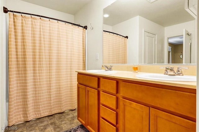 9236 Keystone Ridge Ave, Las Vegas, NV 89148 - bathroom featuring double vanity and curtained shower