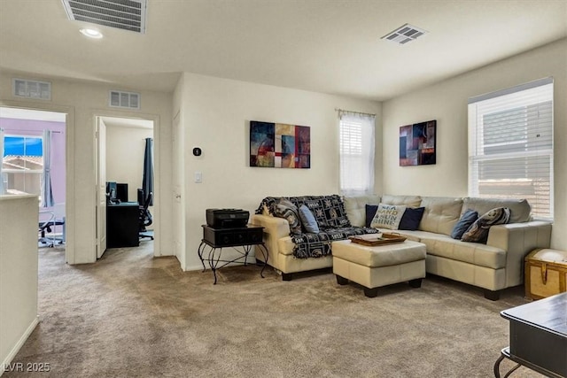 9236 Keystone Ridge Ave, Las Vegas, NV 89148 - living area with light colored carpet, an office area, and baseboards