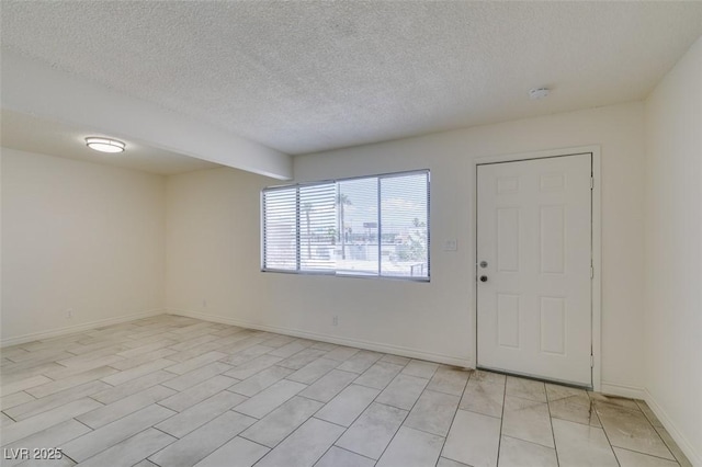 212 Orland St Unit 28, Las Vegas, NV 89107 - entryway with a textured ceiling and baseboards