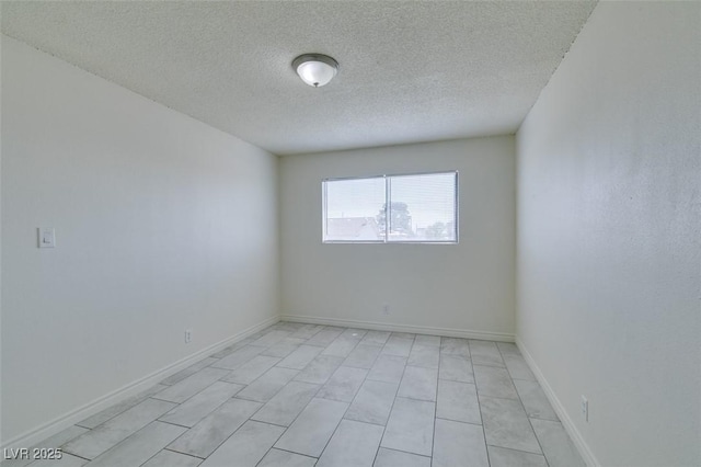 212 Orland St Unit 28, Las Vegas, NV 89107 - spare room featuring a textured ceiling