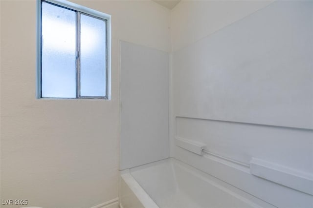 212 Orland St Unit 28, Las Vegas, NV 89107 - bathroom with baseboards and  shower combination
