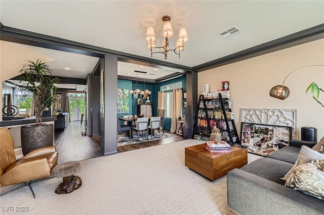 8121 Russell Creek Ct, Las Vegas, NV 89139 - living room with a chandelier, wood finished floors, and ornamental molding