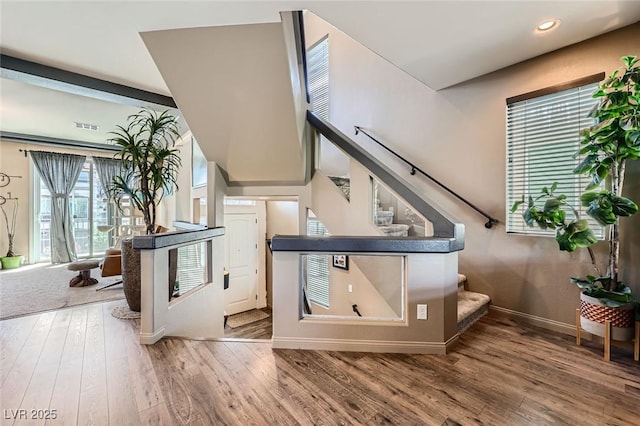 8121 Russell Creek Ct, Las Vegas, NV 89139 - bar area with wood finished floors, stairs, baseboards, and recessed lighting