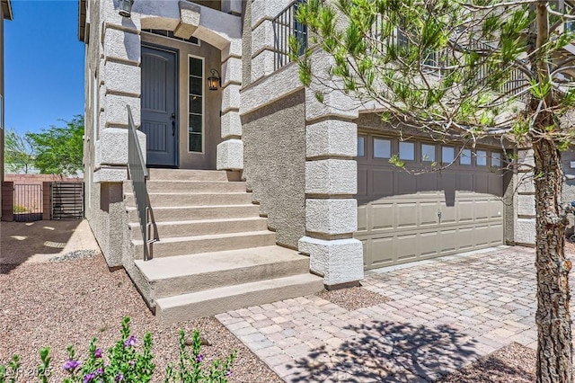 8121 Russell Creek Ct, Las Vegas, NV 89139 - view of exterior entry with stone siding, driveway, and an attached garage