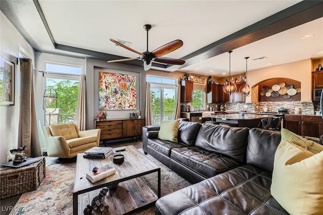 8121 Russell Creek Ct, Las Vegas, NV 89139 - living area featuring ceiling fan, wood finished floors, and recessed lighting