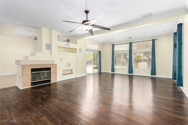 6779 Rainstorm Ridge Ave, Las Vegas, NV 89131 - unfurnished living room with ceiling fan, wood finished floors, ornamental molding, baseboards, and a tiled fireplace