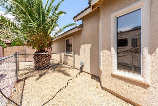 6779 Rainstorm Ridge Ave, Las Vegas, NV 89131 - view of property exterior with stucco siding