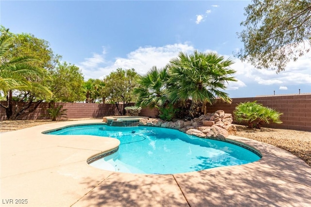 6779 Rainstorm Ridge Ave, Las Vegas, NV 89131 - view of swimming pool featuring a fenced backyard, a patio, and a pool with connected hot tub