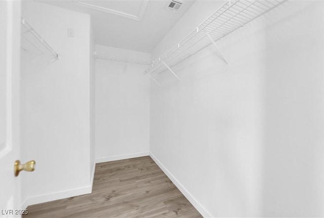 3228 Jumping Hills Ave, Henderson, NV 89052 - spacious closet featuring wood finished floors