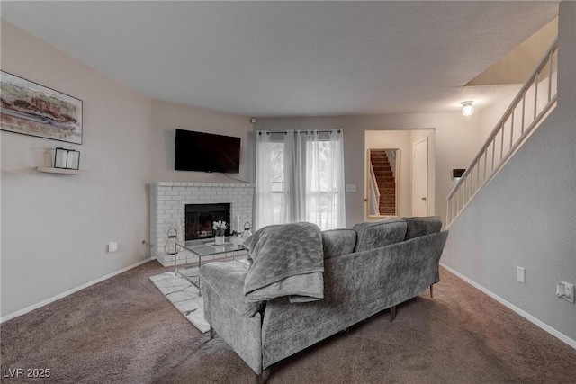 573 Sellers Pl, Henderson, NV 89011 - carpeted living room with stairs, a brick fireplace, and baseboards
