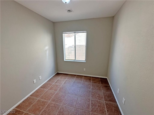 316 Lingering Ln, Henderson, NV 89012 - tiled spare room with baseboards