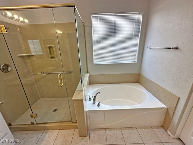 316 Lingering Ln, Henderson, NV 89012 - full bathroom with a garden tub, a shower stall, and tile patterned floors
