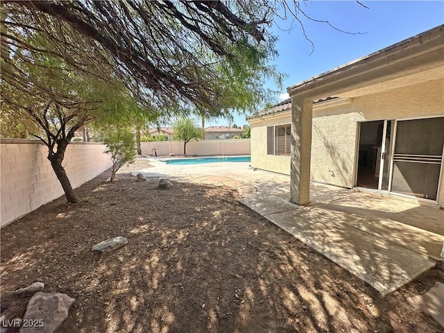 316 Lingering Ln, Henderson, NV 89012 - fenced backyard featuring a patio