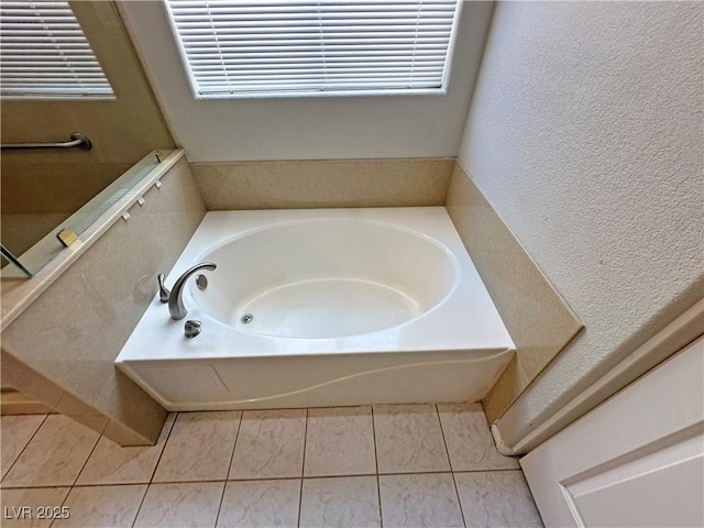 316 Lingering Ln, Henderson, NV 89012 - bathroom with a garden tub, tile patterned flooring, and a textured wall