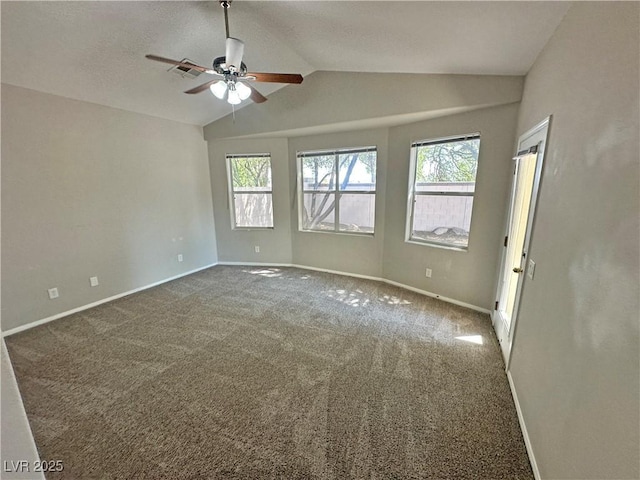 316 Lingering Ln, Henderson, NV 89012 - carpeted empty room with plenty of natural light, vaulted ceiling, ceiling fan, and baseboards