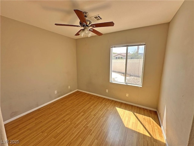 316 Lingering Ln, Henderson, NV 89012 - unfurnished room featuring wood finished floors, baseboards, and ceiling fan