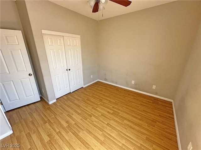 316 Lingering Ln, Henderson, NV 89012 - unfurnished bedroom with light wood-type flooring, baseboards, a closet, and a ceiling fan