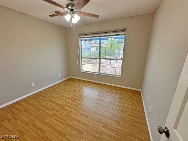 316 Lingering Ln, Henderson, NV 89012 - spare room with light wood-type flooring, baseboards, and a ceiling fan
