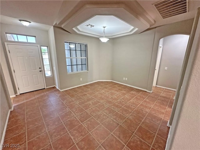 316 Lingering Ln, Henderson, NV 89012 - tiled foyer entrance featuring arched walkways and baseboards