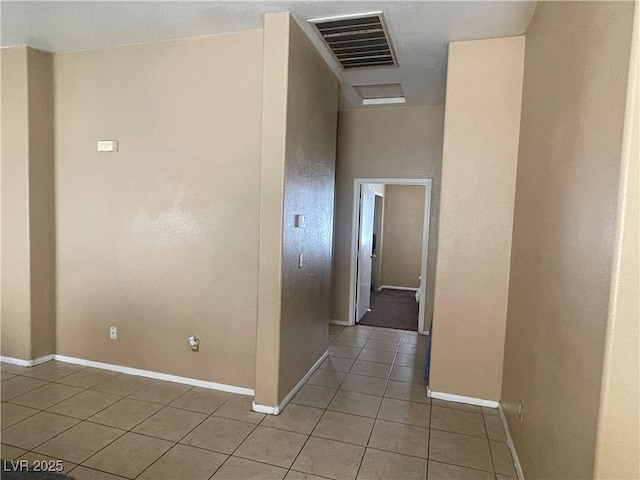 1667 Marion Bennet Dr, Las Vegas, NV 89106 - hall featuring light tile patterned flooring and baseboards