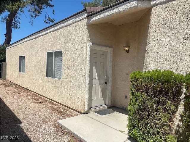 1667 Marion Bennet Dr, Las Vegas, NV 89106 - property entrance featuring stucco siding