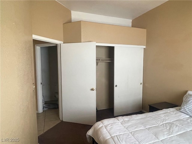 1667 Marion Bennet Dr, Las Vegas, NV 89106 - tiled bedroom with a closet